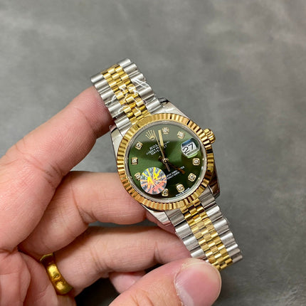 DATEJUST 31MM GOLD STEEL GREEN DIAL