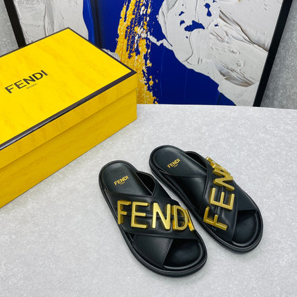 FENDI GRAPHY LOGO LETTERING SLIDES IN BLACK LAMBSKIN WITH GOLD HARDWARE