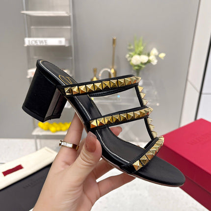 VALENTINO 26S ROCKSTUD STRAPPY BLOCK HEEL SLIDE SANDALS IN BLACK CALFSKIN GOLD HARDWARE