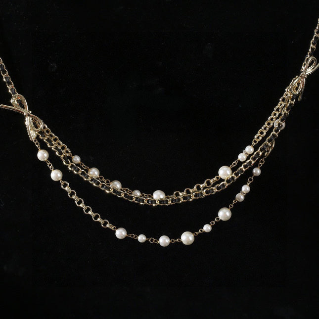 CHANEL 25S GOLD CHAIN BELT WITH PEARL 610440
