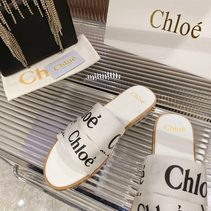 WOODY SLIPPER IN WHITE MIX BLACK CANVAS