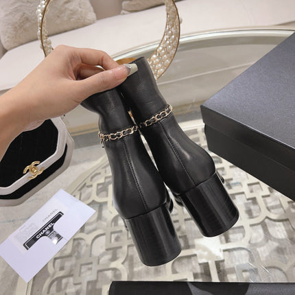 MID-HEEL ANKLE BOOTS IN BLACK SMOOTH CALFSKIN