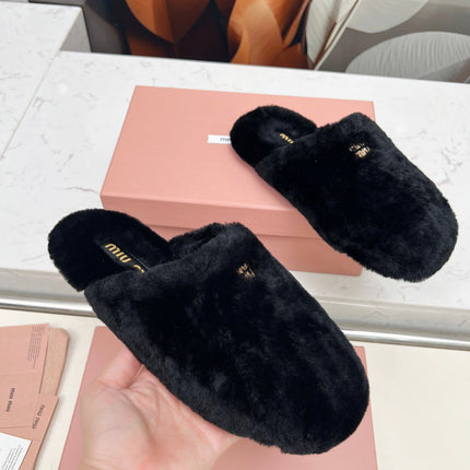 MIUMIU 26S MULES IN BLACK SHEARLING