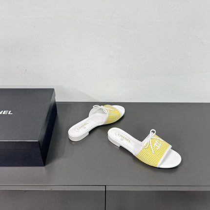 CC STRIPED SLIDE SANDALS IN YELLOW AND WHITE CANVAS