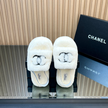 CHANEL 25S THICK-SOLED FURRY SLIPPERS WITH ELASTIC STRAPS IN WHITE FUR