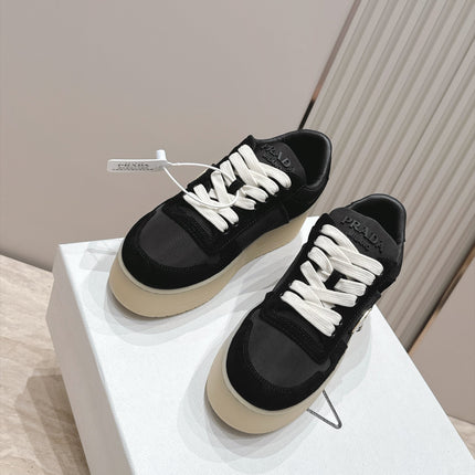 PRADA 26S PLATFORM SNEAKERS 50MM IN BLACK AND WHITE SUEDE AND WATERPROOF FABRIC