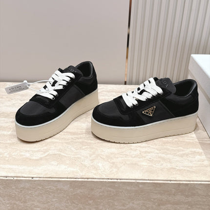 PRADA 26S PLATFORM SNEAKERS 50MM IN BLACK AND WHITE SUEDE AND WATERPROOF FABRIC