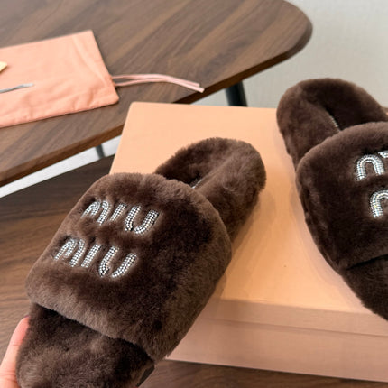 MIUMIU 26S CRYSTAL LOGO SLIDES IN DARK BROWN SHEARLING