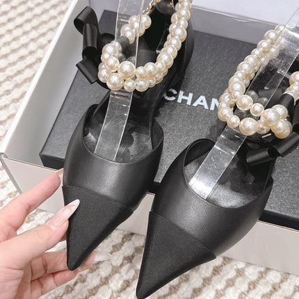 CHANEL 25S ESPADRILLE FLATS IN BLACK CALFSKIN WITH PEARL STRAP