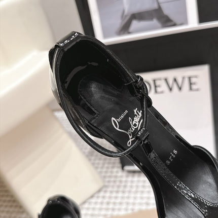 CHRISTIAN LOUBOUTIN 26S T-STRAP PUMP 100 MM IN BLACK PATENT CALFSKIN