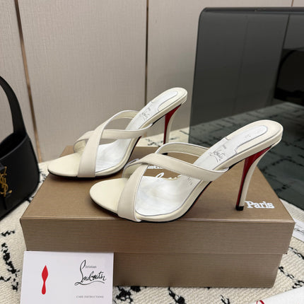 CHRISTIAN LOUBOUTIN 26S CROSS-STRAP HIGH HEEL SANDALS 105 MM IN CREAM WHITE CALFSKIN
