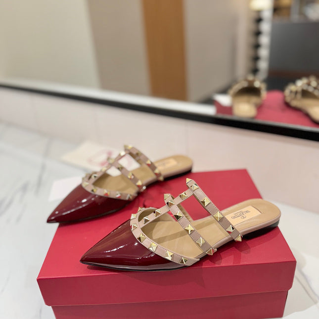 VALENTINO 26S STUDDED FLAT MULES IN DARK RED PATENT CALFSKIN