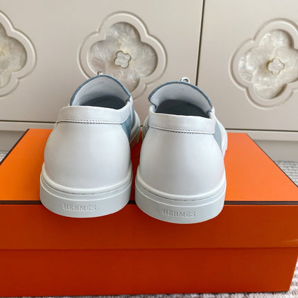 HM 25S SLIP-ON IN SKY BLUE CANVAS WITH SILVER HARDWARE