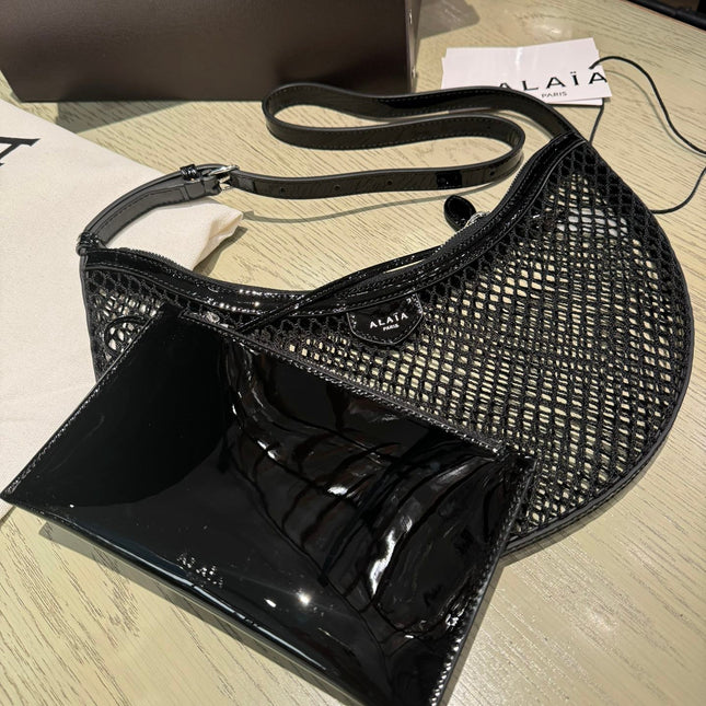 ONE PIECE DEMI LUNE BAG 31 IN BLACK FISHNET