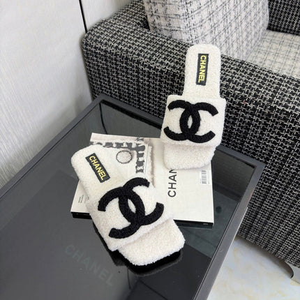 CHANEL 26S SLIDE SANDALS IN BLACK AND WHITE SHEARLING SQUARE TOE