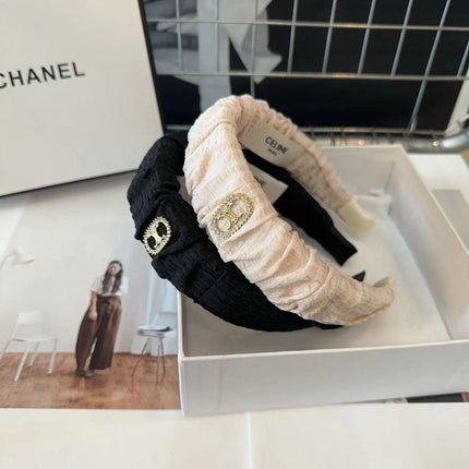 BLACK FABRIC WITH GOLD LOGO HAIRBAND 414448