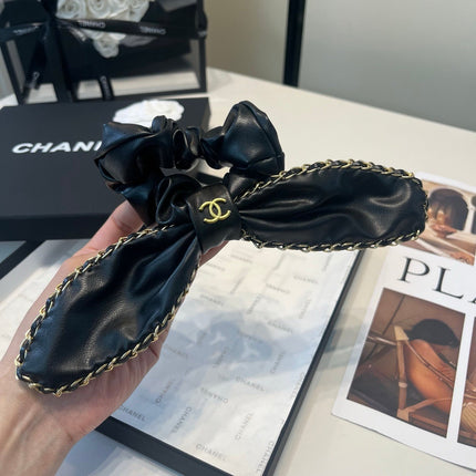 CHANEL 26S BOW SCRUNCHIE IN BLACK LEATHER 512119