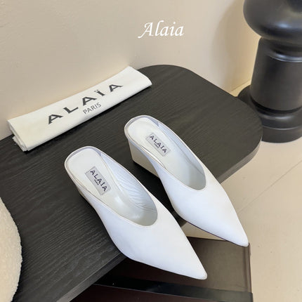 ALAIA HIGH MULES 25S IN WHITE SATIN