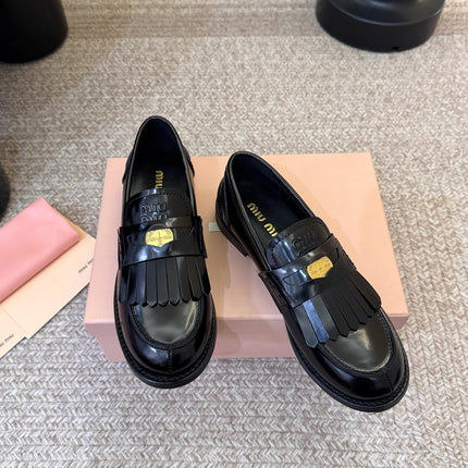 MIUMIU 26S FRINGE PENNY LOAFERS IN BLACK CALFSKIN