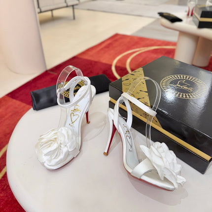 CHRISTIAN LOUBOUTIN 26S FLOWER-EMBELLISHED SANDALS 100 MM IN WHITE SATIN