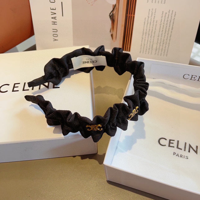 BLACK FABRIC WITH GOLD LOGO HAIRBAND 415931