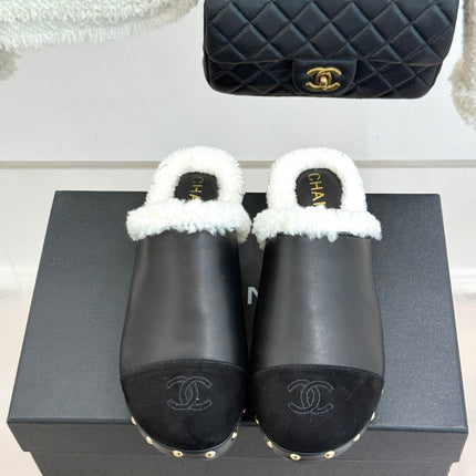 CHANEL 26S SHEARLING LINED CLOG MULES IN BLACK CALFSKIN AND SUEDE