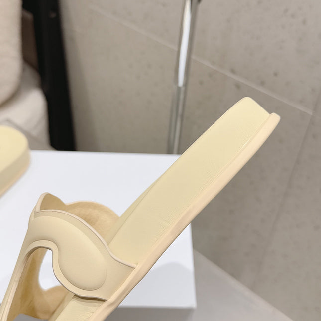 CELINE 26S TRIOMPHE SLIDES IN PASTEL YELLOW CALFSKIN