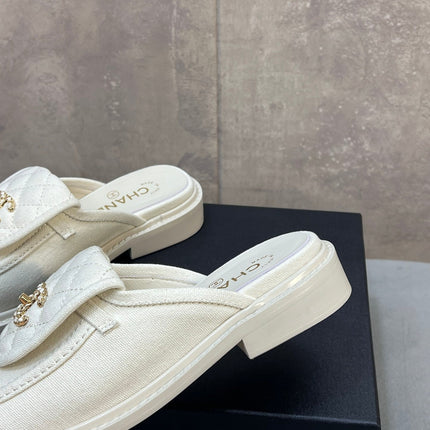 CHANEL 26S MULE LOAFERS IN WHITE CANVAS WITH QUILTED FLAP & CC LOGO