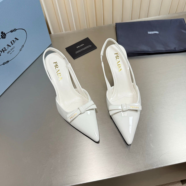 PRADA 26S POINTED-TOE SLINGBACK PUMPS IN WHITE PATENT CALFSKIN WITH BOW