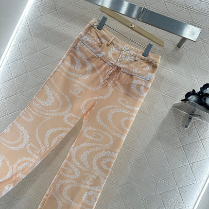 CHANEL BEIGE PRINTED DENIM PANTS