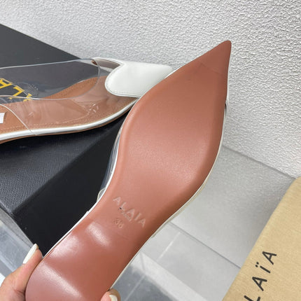 ALAIA LE COEUR FLAT SLINGBACKS IN WHITE PATENT LAMBSKIN