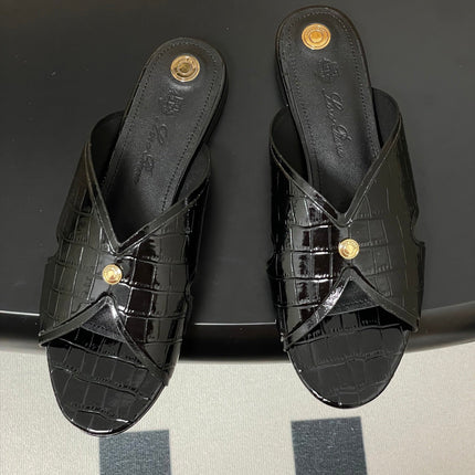 FLAT SLIPPERS IN BLACK CALFSKIN SNAKE EMBOSSING