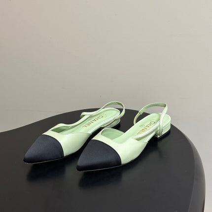 CHANEL 26S POINTED TOE SLINGBACKS IN PASTEL GREEN LAMBSKIN AND BLACK FABRIC