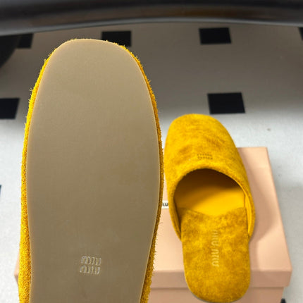 MIUMIU 26S MULE LOAFERS IN OCHRE YELLOW SUEDE LOGO