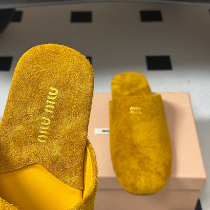 MIUMIU 26S MULE LOAFERS IN OCHRE YELLOW SUEDE LOGO
