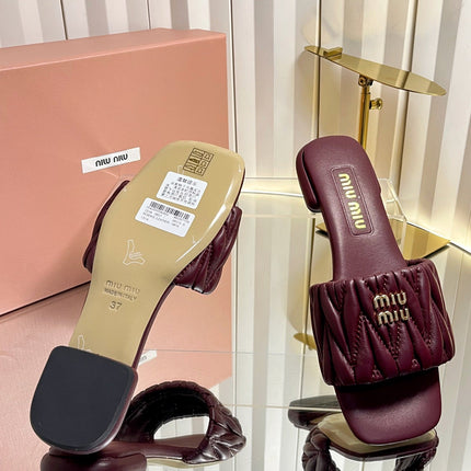 MIUMIU 26S MATELASSE SLIDES IN BURGUNDY RED CALFSKIN GOLD HARDWARE