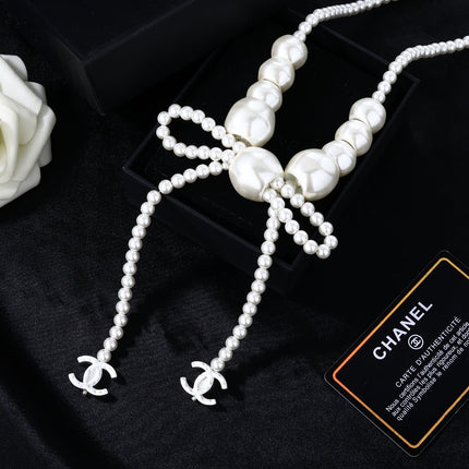CHANEL 25S CHAIN BELT IN WHITE PEARL WITH BOW 614475