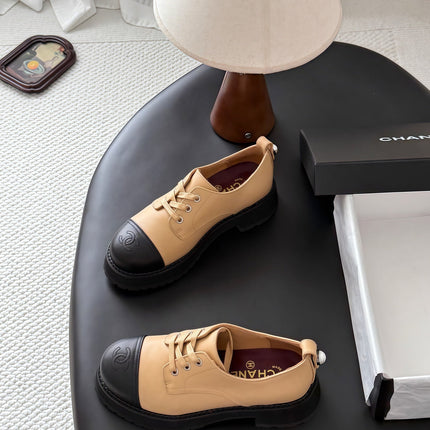 CHANEL 26S LACE UP PLATFORM IN BLACK AND BEIGE CALFSKIN