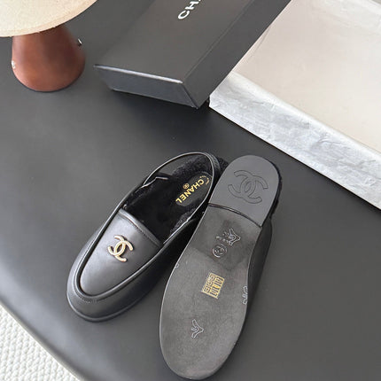 CHANEL 26S SLINGBACK LOAFERS IN BLACK CALFSKIN AND SHEARLING LINING