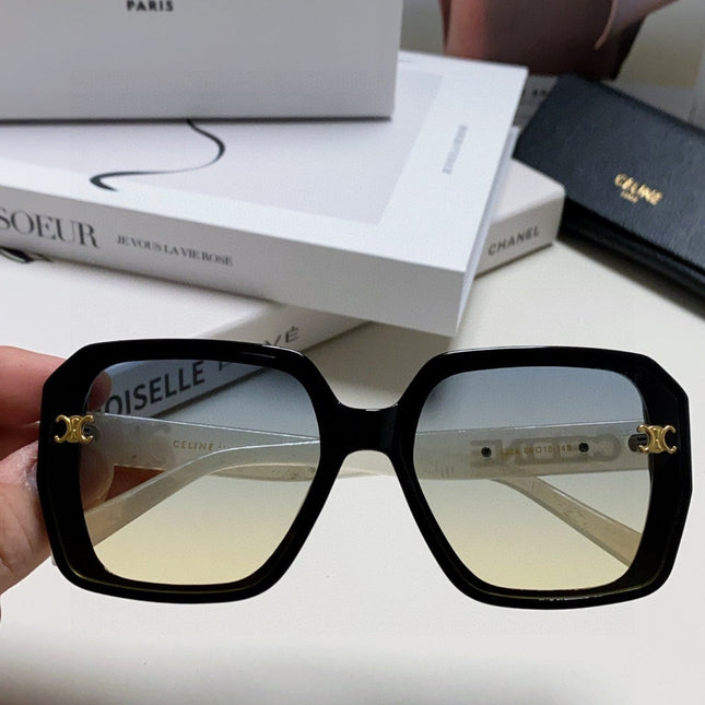 TRIOMPHE SUNGLASSES 548593 IN BLACK AND WHITE ACETATE