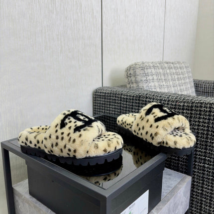 CHANEL 26S PLATFORM SLIDE SANDALS IN BEIGE AND BLACK SHEARLING DALMATIAN PRINT