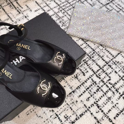 FLAT SLINGBACKS IN BLACK CALFSKIN