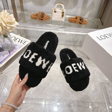 LOEWE 26S FLUFFY SLIDE SANDALS IN BLACK SHEARLING WITH WHITE LOGO