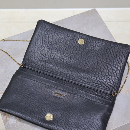 CALYPSO POUCH 24 IN BLACK ELEPHANT TEXTURED LAMBSKIN GOLD LOGO