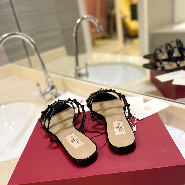VALENTINO 26S ROCKSTUD CAGED SANDALS IN BLACK PATENT CALFSKIN