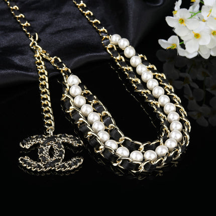CHANEL 25S CHAIN BELT IN WHITE PEARL AND BLACK CALFSKIN 612711
