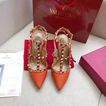 ROCKSTUD FIRE ORANGE METALLIC CALFSKIN ANKLE STRAP HIGH SANDAL