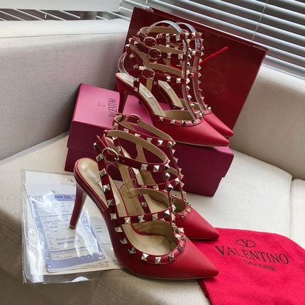 ROCKSTUD RUBY RED METALLIC CALFSKIN ANKLE STRAP HIGH SANDAL